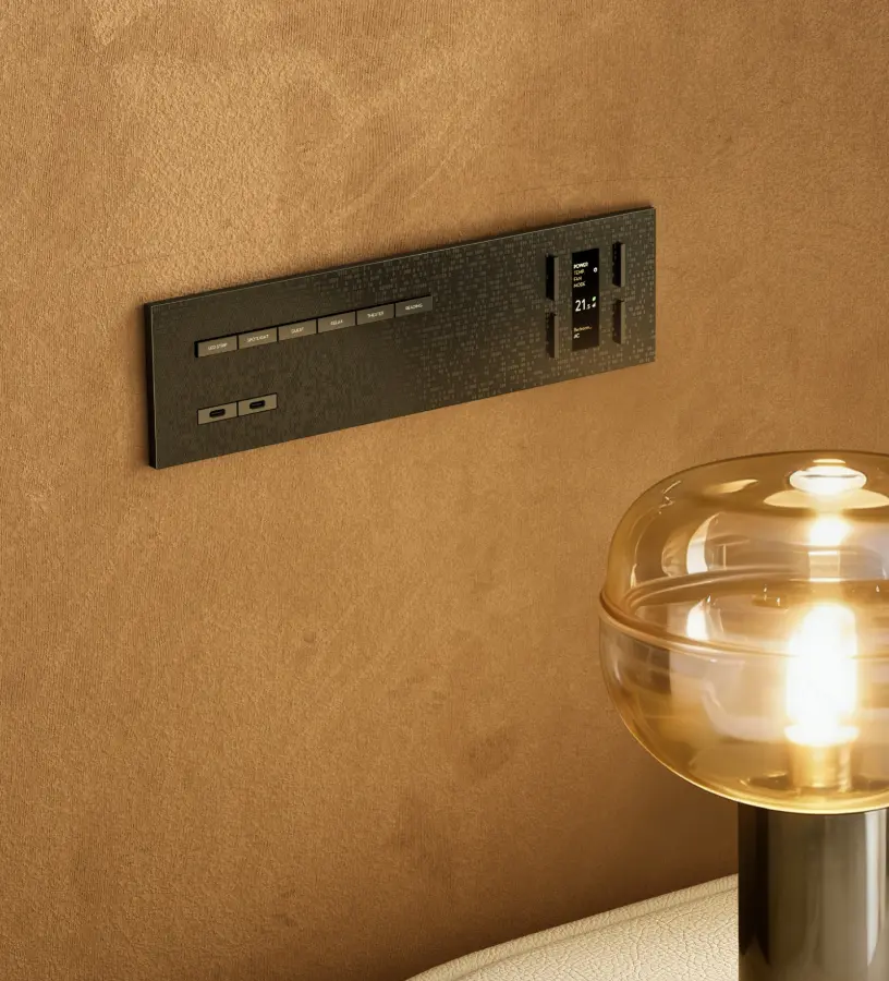 SUBLIME horizontal keypad installed on a textured interior wall